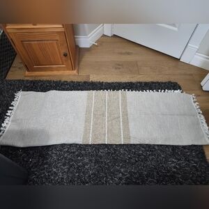 Beige and White Fringed Table Cloth